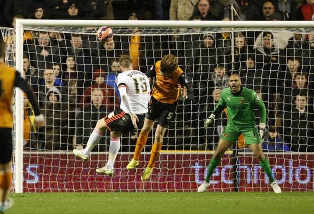 Cauley Woodrow scores the opening goal of the game for Fulham- Football - FA Cup third round replay - Wolverhampton Wanderers - FC Fulham EDITORIAL USE ONLY. No use with unauthorised audio, video, data, fixture lists, club league logos or live services. Online in-match use limited to 120 images, no video emulation. No use in betting, games or single club league player publications.
