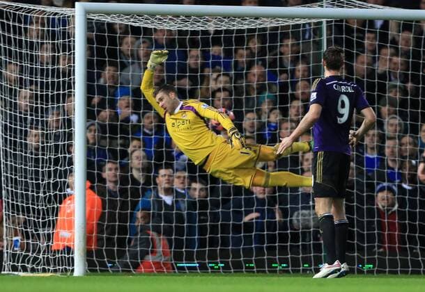 West Ham s Adrian gets beaten by Everton s Kevin Mirallas to make it 1-1 FA Cup 3rd Round Replay - West Ham United - FC Everton - Upton Park - England - 13th January 2015 - EDITORIAL USE ONLY. No use with unauthorised audio, video, data, fixture lists, club league logos or live services. Online in-match use limited to 120 images, no video emulation. No use in betting, games or single club league player publications.