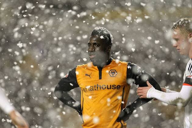 Nouha Dicko of Wolves struggles to be seen in the snowy conditions - Football - FA Cup third round replay - Wolverhampton Wanderers vs Fulham - Molineux Wolverhampton - Season 2014 15 - 13 01 2015 - Photo: MalcolmCouzens Sportimage EDITORIAL USE ONLY. No use with unauthorised audio, video, data, fixture lists, club league logos or live services. Online in-match use limited to 120 images, no video emulation. No use in betting, games or single club league player publications.