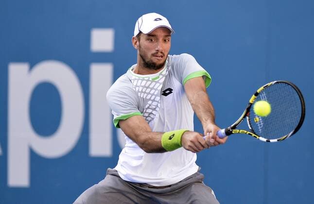 16.01.15 Sydney, Australia.Victor Troicki (SRB) in action against Gilles Muller (LUX) during their semifinal match at the Apia International Sydney. xNigelxOwenx  ActionPlus11589561