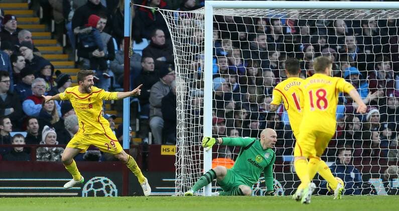 Fabio Borini of Liverpool (l) turns to celebrate scoring the first goal - Barclays Premier League - Aston Villa vs Liverpool - Villa Park Stadium - Birmingham - England - 17th January 2015 - Picture Simon Bellis Sportimage EDITORIAL USE ONLY. No use with unauthorised audio, video, data, fixture lists, club league logos or live services. Online in-match use limited to 120 images, no video emulation. No use in betting, games or single club league player publications.