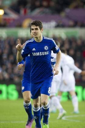Football - 2014 2015 Premier League - Swansea City vs. Chelsea Oscar of Chelsea celebrates scoring at The Liberty Stadium. COLORSPORT WINSTON BYNORTH 