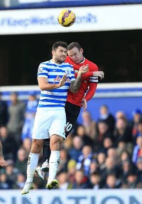 QPR s Charlie Austin tussles with Manchester United ManU s Wayne Rooney Barclays Premier League - Queens Park Rangers vs Manchester United - Loftus Road - England - 17th January 2015 - Picture David Klein Sportimage EDITORIAL USE ONLY. No use with unauthorised audio, video, data, fixture lists, club league logos or live services. Online in-match use limited to 120 images, no video emulation. No use in betting, games or single club league player publications.