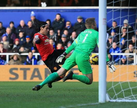 QPR s Rob Green saves from Manchester United ManU s Falcao Barclays Premier League - Queens Park Rangers vs Manchester United - Loftus Road - England - 17th January 2015 - Picture David Klein Sportimage EDITORIAL USE ONLY. No use with unauthorised audio, video, data, fixture lists, club league logos or live services. Online in-match use limited to 120 images, no video emulation. No use in betting, games or single club league player publications.