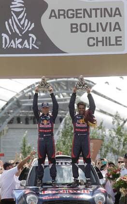 Aktuell Rallye Dakar - Siegerehrung in Buenos Aires 17-jan-2015 Qatari pilot Nasser Al-Attiyah (R) and his French co-pilot Matthieu Baumel (L) celebrate after winning champion of the cars category in the Dakar Rally 2015 at the Tecnopolis Center in in Buenos Aires, capital of Argentina, on Jan. 17, 2015. Alberto Raggio) (SP)ARGENTINA-BUENOS AIRES-RACING-DAKAR e ALBERTOxRAGGIO 