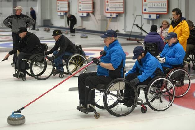 Team Canada s Gary Cormack (C), Gerry Austgarden (R) and Samantha Siu compete during the 2015 BC Wheelchair Curling Championship in Richmond, BC, Canada, Jan.17, 2015. A 3-day championship will see Canada s top curlers battle for the trophy. ) (SP)CANADA-RICHIMOND-CURLING SergeixBachlakov 