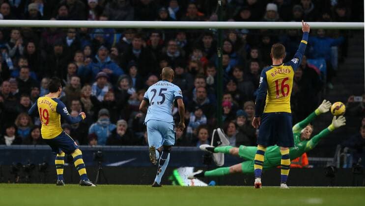 Santi Cazorla of Arsenal scores from the penalty spot past Joe Hart of Manchester City to go 0-1 up - Barclays Premier League - Manchester City vs Arsenal - Etihad Stadium - Manchester - England - 18th January 2015 - Picture Simon Bellis Sportimage EDITORIAL USE ONLY. No use with unauthorised audio, video, data, fixture lists, club league logos or live services. Online in-match use limited to 120 images, no video emulation. No use in betting, games or single club league player publications.