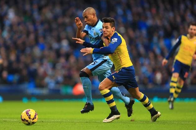 Fernando of Manchester City battles Arsenal s Alexis Sanchez - Manchester City vs. Arsenal - Barclay s Premier League - Etihad Stadium - Manchester - 18 01 2015 Pic Philip Oldham Sportimage EDITORIAL USE ONLY. No use with unauthorised audio, video, data, fixture lists, club league logos or live services. Online in-match use limited to 120 images, no video emulation. No use in betting, games or single club league player publications.