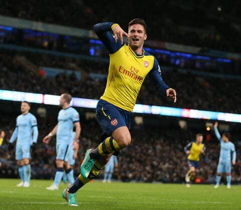 Olivier Giroud of Arsenal celebrates scoring the second goal - Barclays Premier League - Manchester City vs Arsenal - Etihad Stadium - Manchester - England - 18th January 2015 - Picture Simon Bellis Sportimage EDITORIAL USE ONLY. No use with unauthorised audio, video, data, fixture lists, club league logos or live services. Online in-match use limited to 120 images, no video emulation. No use in betting, games or single club league player publications.