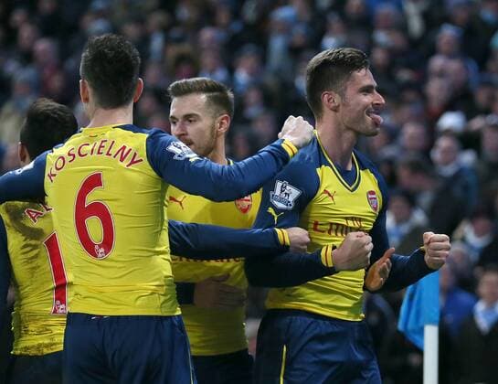 Olivier Giroud of Arsenal celebrates scoring the second goal - Barclays Premier League - Manchester City vs Arsenal - Etihad Stadium - Manchester - England - 18th January 2015 - Picture Simon Bellis Sportimage EDITORIAL USE ONLY. No use with unauthorised audio, video, data, fixture lists, club league logos or live services. Online in-match use limited to 120 images, no video emulation. No use in betting, games or single club league player publications.