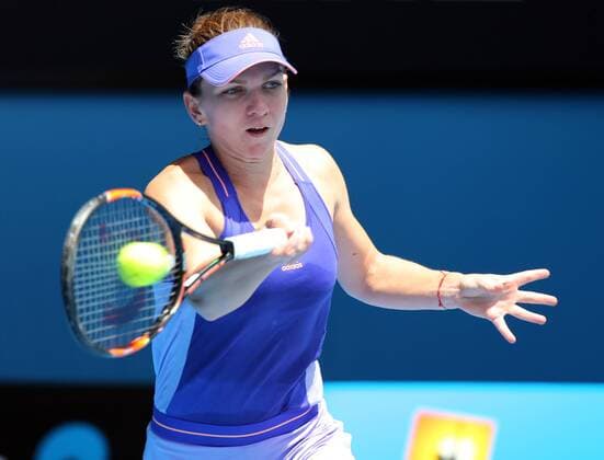 Simona Halep of Romania returns a hitduring the women s singles first round match at the 2015 Australian Open tennis tournament in Melbourne, Australia, Jan. 19, 2015. (SP) XuxYanyan 