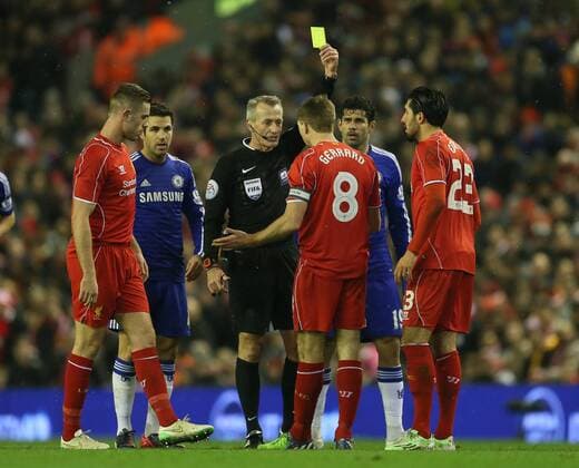 Aktuell Fußball, England, Capital One Cup, FC Liverpool - FC Chelsea Yellow card for Steven Gerrard of Liverpool - Capital One Cup - Semi Final First Leg - Liverpool vs Chelsea - Anfield Stadium - Liverpool - England - 20th January 2015 - Picture Simon Bellis Sportimage EDITORIAL USE ONLY. No use with unauthorised audio, video, data, fixture lists, club league logos or live services. Online in-match use limited to 120 images, no video emulation. No use in betting, games or single club league player publications.