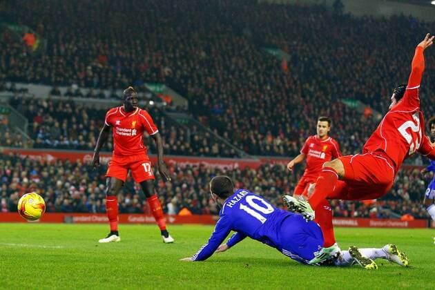Aktuell FuÃŸball, England, Capital One Cup, FC Liverpool - FC Chelsea 20.01.2015. Anfield, Liverpool, England. Capital One Cup Semi Final. Liverpool versus Chelsea. Liverpool midfielder Emre Can fouls Chelsea midfielder Eden Hazard to concede the penalty xPaulxKeevilx  ActionPlus11591145