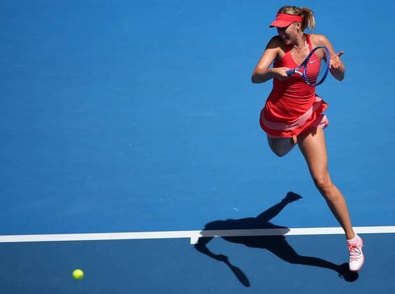 (150121) -- MELBOURNE, Jan. 21, 2015 -- Maria Sharapova of Russia returns the ball during the second round match of women s singles at the 2015 Australian Open tournament in Melbourne, Australia, Jan. 21, 2015. XuxYanyan 