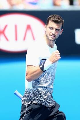 Grigor Dimitrov of Bulgaria celebrates after scoring in their men s singles third round match of the 2015 Australian Open tennis tournament in Melbourne, Victoria, Australia, 23 January 2015.  20150123_06909
