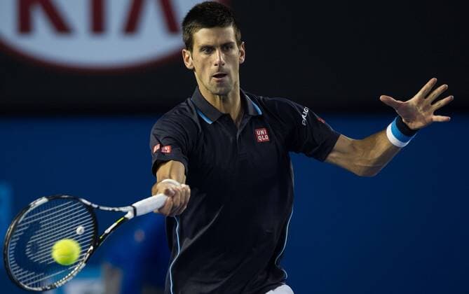 (150124) -- MELBOURNE, Jan. 24, 2015 -- Novak Djokovic of Serbia returns the ball during the men s singles third round match at the 2015 Australian Open tennis tournament at Melbourne Park in Melbourne, Australia, Jan. 24, 2015. (SP)AUSTRALIA-MELBOURNE-TENNIS-DJOKOVIC BaixXue 