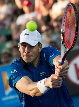 (150124) -- MELBOURNE, Jan. 24, 2015 -- John Isner of the U.S. returns the ball during the men s singles third round match at the 2015 Australian Open tennis tournament at Melbourne Park in Melbourne, Australia, Jan. 24, 2015. (SP)AUSTRALIA-MELBOURNE-TENNIS-ISNER BaixXue 
