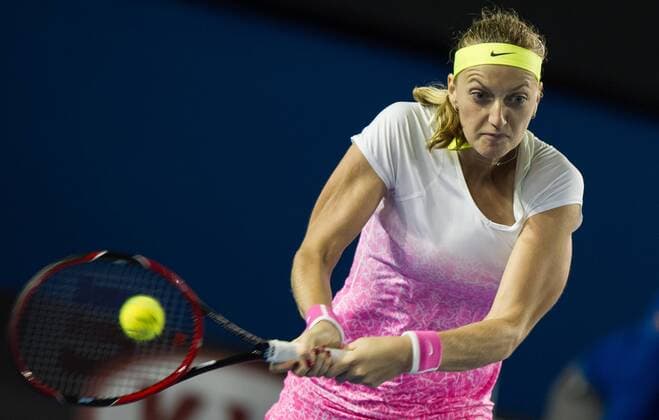 (150124) -- MELBOURNE, Jan. 24, 2015 -- Petra Kvitova of the Czech Republic returns the ball during the women s singles third round match at the 2015 Australian Open tennis tournament at Melbourne Park in Melbourne, Australia, Jan. 24, 2015. (SP)AUSTRALIA-MELBOURNE-TENNIS-KVITOVA BaixXue 