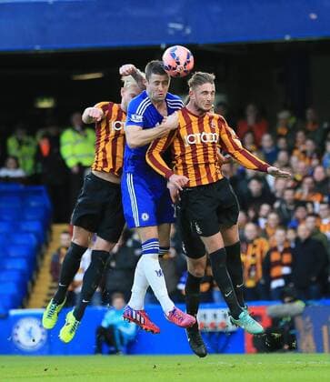 Chelsea s Gary Cahill tussles with Bradford s Gary Liddle FA Cup Fourth Round - Chelsea vs Bradford City - Stamford Bridge - England - 24th January 2015 - Picture David Klein Sportimage EDITORIAL USE ONLY. No use with unauthorised audio, video, data, fixture lists, club league logos or live services. Online in-match use limited to 120 images, no video emulation. No use in betting, games or single club league player publications.