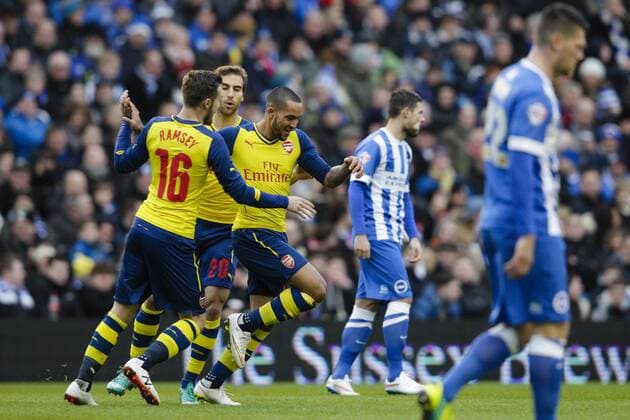 25.01.2015. Brighton, England. FA Cup 4th Round. Brighton versus Arsenal. Arsenal& x2019;s Theo Walcott celebrates his goal with teammates xCraigxMercerx  ActionPlus11592457