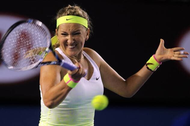 (150126) -- MELBOURNE, Jan. 26, 2015 -- Victoria Azarenka of Belarus returns the ball during the women s singles fourth round match at Australian Open tournament in Melbourne, Australia, Jan. 26, 2015. JinxLinpeng 