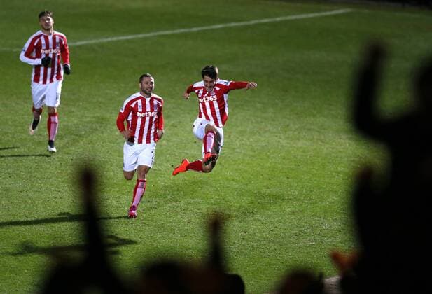 Bojan Krkic of Stoke City leaps up to celebrate in front of his fans after scoring the first goal - FA Cup Fourth Round - Rochdale vs Stoke City - Spotland Stadium - Rochdale - Manchester - England - 26th January 2015 - Picture Simon Bellis Sportimage EDITORIAL USE ONLY. No use with unauthorised audio, video, data, fixture lists, club league logos or live services. Online in-match use limited to 120 images, no video emulation. No use in betting, games or single club league player publications.