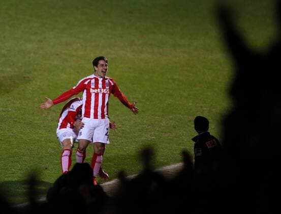 Bojan Krkic of Stoke City leaps up to celebrate in front of his fans after scoring the first goal - FA Cup Fourth Round - Rochdale vs Stoke City - Spotland Stadium - Rochdale - Manchester - England - 26th January 2015 - Picture Simon Bellis Sportimage EDITORIAL USE ONLY. No use with unauthorised audio, video, data, fixture lists, club league logos or live services. Online in-match use limited to 120 images, no video emulation. No use in betting, games or single club league player publications.