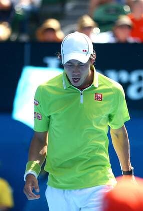 Kei Nishikori of Japan reacts after missing a shot in their men s singles quarterfinal match of the 2015 Australian Open tennis tournament in Melbourne, Victoria, Australia, 28 January 2015.  20150128_28357