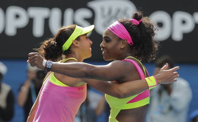 Serena Williams of the United States, right, hugs Madison Keys of the United States after defeating her in their women s singles semifinal match of the 2015 Australian Open tennis tournament in Melbourne, Australia, 29 January 2015.  20150129_28675