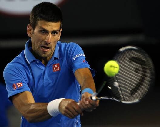 Serbia s Novak Djokovic returns the ball during his men s singles semifinal match at the Australian Open tennis championship in Melbourne, Australia, Jan. 30, 2015. (SP)AUSTRALIA-MELBOURNE-TENNIS-AUSTRALIAN OPEN-MEN S SINGLES SEMIFINAL XuxYanyan 