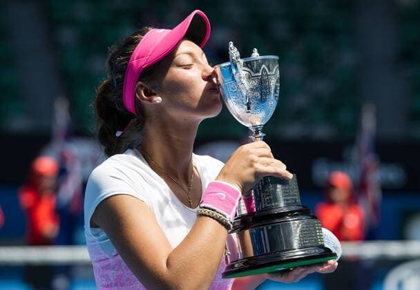 (150131) -- MELBOURNE, Jan. 31, 2015 -- Tereza Mihalikova of Slovakia kisses her trophy after the Junior Girls Singles final match at the 2015 Australian Open tennis tournament at Melbourne Park in Melbourne, Australia, Jan. 31, 2015. Mihalikova won 2-0. ) (SP)AUSTRALIA-MELBOURNE-TENNIS-AUSTRALIAN OPEN-JUNIOR GIRLS SINGLES BaixXue 