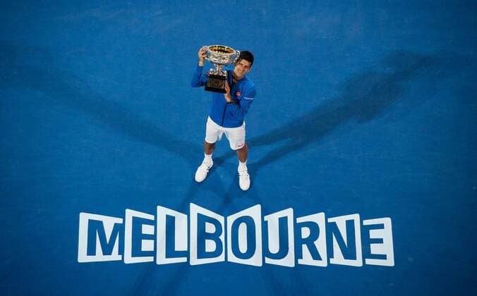 (150201) -- MELBOURNE, Feb. 1, 2015 -- Novak Djokovic of Serbia poses with the trophy after winning his men s singles final match at 2015 Australian Open tennis tournament at Melbourne Park in Melbourne, Australia on Feb. 1, 2015. BaixXue 