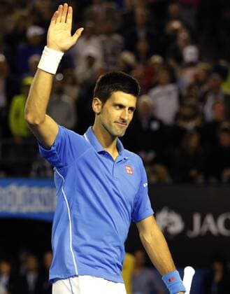 (150201) -- MELBOURNE, Feb. 1, 2015 -- Novak Djokovic of Serbia reacts after winning his men s singles final match at 2015 Australian Open tennis tournament at Melbourne Park in Melbourne, Australia on Feb. 1, 2015. XuxYanyan 