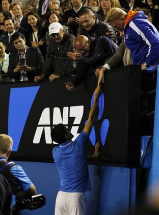 (150201) -- MELBOURNE, Feb. 1, 2015 -- Novak Djokovic of Serbia shakes hands with his team Boris Becker after winning his men s singles final match at 2015 Australian Open tennis tournament at Melbourne Park in Melbourne, Australia on Feb. 1, 2015. XuxYanyan 