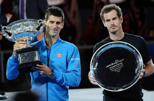 (150201) -- MELBOURNE, Feb. 1, 2015 -- Novak Djokovic (L) of Serbia and Andy Murray of Great Britain pose with their trophies after the men s singles final match at 2015 Australian Open tennis tournament at Melbourne Park in Melbourne, Australia on Feb. 1, 2015. XuxYanyan 