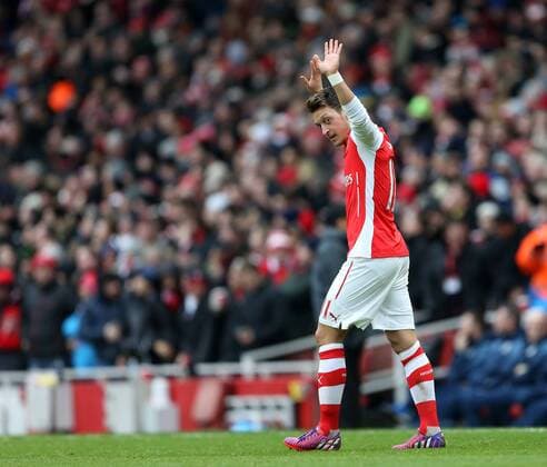 Aktuell Fußball, England, Premier League, FC Arsenal - Aston Villa Arsenal s Mesut Ozil celebrates scoring his sides second goal Barclays Premier League - Arsenal vs Aston Villa - Emirates Stadium - England - 1st February 2015 - Picture David Klein Sportimage EDITORIAL USE ONLY. No use with unauthorised audio, video, data, fixture lists, club league logos or live services. Online in-match use limited to 120 images, no video emulation. No use in betting, games or single club league player publications.