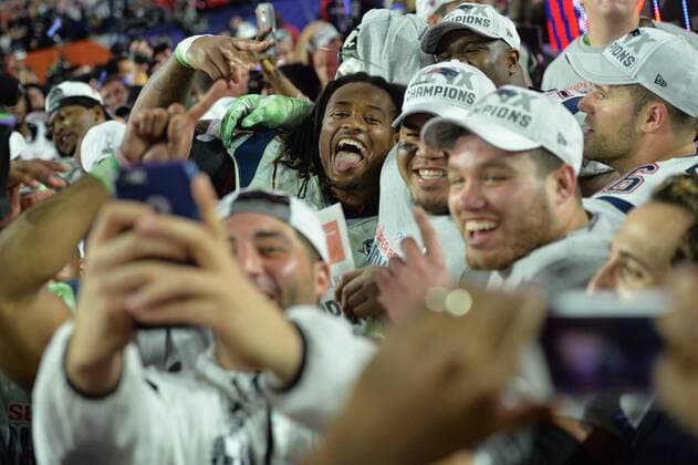 New England Patriots players make a selfie after the Patriots defeated the Seattle Seahawks 28-24 to win Super Bowl XLIX at University of Phoenix Stadium in Glendale, Arizona, February 1, 2015.  SBP20150201109 KEVINxDIETSCH