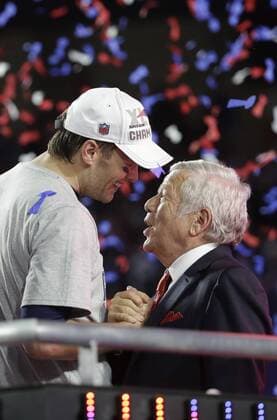 New England Patriots owner Robert Kraft (R) congratulates Patriots quarterback MVP Tom Brady after winning the Super Bowl XLIX at University of Phoenix Stadium in Glendale, Arizona, February 1, 2015. New England beat Seattle 28-24 to win the Lombardi trophy and Super Bowl XLIX.  SBP20150201358 JOHNxANGELILLO
