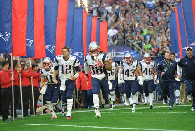 New England Patriots QB Tom Brady (12) and his team take the field to play the Seattle Seahawks in Super Bowl XLIX at University of Phoenix Stadium in Glendale, Arizona, February 1, 2015.  SBP20150201032 KEVINxDIETSCH
