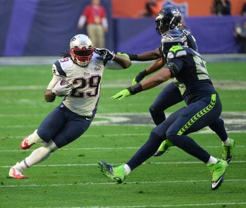 New England Patriots RB LeGarrette Blount (29) runs against the Seattle Seahawks in the first quarter of Super Bowl XLIX at University of Phoenix Stadium in Glendale, Arizona, February 1, 2015.  SBP20150201039 PATxBENIC
