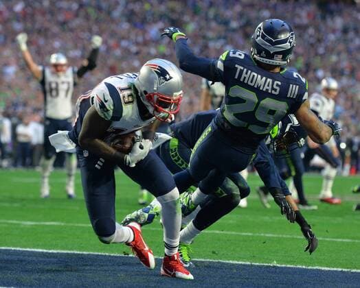 New England Patriots wide receiver Brandon LaFell tumbles into the endzone after catching an 11-yard touchdown pass against the Seattle Seahawks in the second quarter of Super Bowl XLIX at University of Phoenix Stadium in Glendale, Arizona, February 1, 2015.  SBP20150201042 KEVINxDIETSCH
