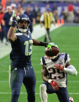 Seattle Seahawks WR Chris Matthews (13) celebrates catching a Russell Wilson pass for 44 yards against New England Patriots Kyle Arrington in the second quarter of Super Bowl XLIX at University of Phoenix Stadium in Glendale, Arizona, February 1, 2015.  SBP20150201052 PATxBENIC