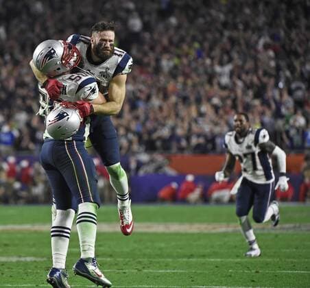 New England Patriots Rob Ninkovich (50) and WR Julian Edelman (R) celebrate a Malcolm Butler interception of a Seattle Seahawks pass with 26 seconds remaining in Super Bowl XLIX at University of Phoenix Stadium in Glendale, Arizona, February 1, 2015. The Patriots won 28-24.  SBP20150201095 KEVINxDIETSCH
