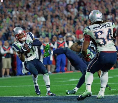 New England Patriots Malcolm Butler (L) intercepts a Seattle Seahawks Russell Wilson pass with 26 seconds remaining in Super Bowl XLIX at University of Phoenix Stadium in Glendale, Arizona, February 1, 2015. The Patriots won 28-24.  SBP20150201110 KEVINxDIETSCH