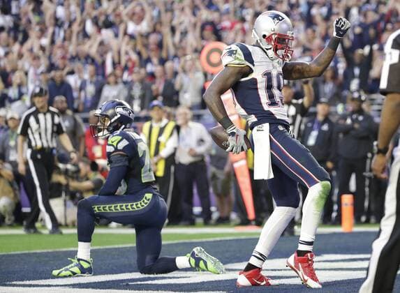 New England Patriots wide receiver Brandon LaFell (R) celebrates in the endzone after catching a 11-yard touchdown pass against the Seattle Seahawks safety Earl Thomas in the second quarter of Super Bowl XLIX at University of Phoenix Stadium in Glendale, Arizona, February 1, 2015.  SBP20150201327 JOHNxANGELILLO