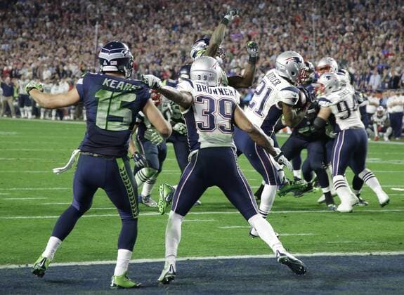 New England Patriots cornerback Malcolm Butler (R) intercepts at the one yard line late in the fourth quarter against the Seattle Seahawks in Super Bowl XLIX at University of Phoenix Stadium in Glendale, Arizona, February 1, 2015. New England beat Seattle 28-24 to win the Lombardi trophy and Super Bowl XLIX.  SBP20150201362 JOHNxANGELILLO