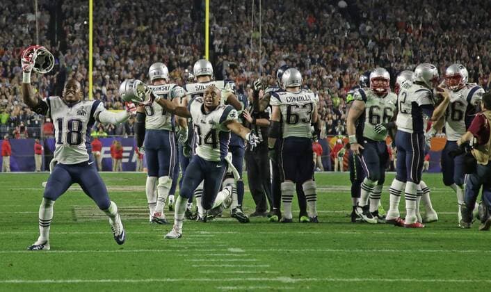 New England Patriots wide receiver Matthew Slater (18) celebrates with 13 seconds on the clock in the fourth quarter against the Seattle Seahawks at Super Bowl XLIX at University of Phoenix Stadium in Glendale, Arizona, February 1, 2015. New England beat Seattle 28-24 to win the Lombardi trophy and Super Bowl XLIX.  SBP20150201369 JOHNxANGELILLO