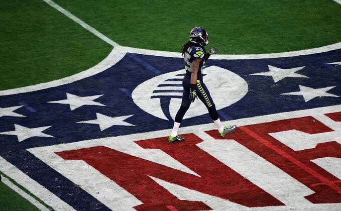 01 February 2015: Seattle Seahawks cornerback Richard Sherman 25 warms up before the start of Super Bowl XLIX between the Seattle Seahawks and the New England Patriots at University of Phoenix Stadium in Glendale, Az. NFL American Football Herren USA FEB 01 Super Bowl XLIX - Patriots v Seahawks Icon3171502010362 EDITORIAL USE ONLY