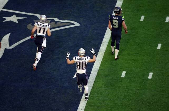 01 February 2015: New England Patriots wide receiver Danny Amendola 80 (bottom) and wide receiver Julian Edelman 11 (top) take the field before the start of Super Bowl XLIX between the Seattle Seahawks and the New England Patriots at University of Phoenix Stadium in Glendale, Az. NFL American Football Herren USA FEB 01 Super Bowl XLIX - Patriots v Seahawks Icon3171502010368 EDITORIAL USE ONLY