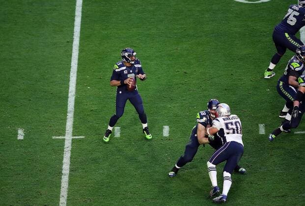 01 February 2015: Seattle Seahawks quarterback Russell Wilson 3 throws during the first half of Super Bowl XLIX between the Seattle Seahawks and the New England Patriots at University of Phoenix Stadium in Glendale, Az. NFL American Football Herren USA FEB 01 Super Bowl XLIX - Patriots v Seahawks Icon3171502011218 EDITORIAL USE ONLY